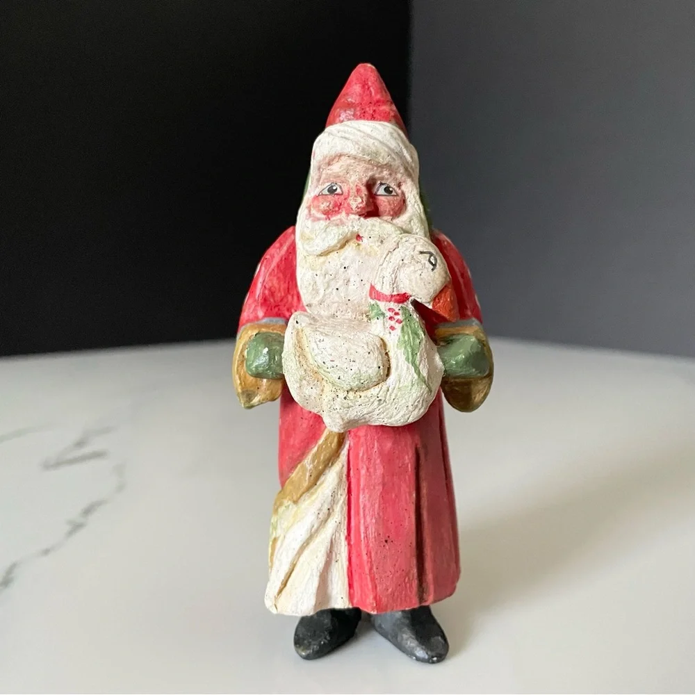 Santa Holding Swan Ornament by House of Hatten
